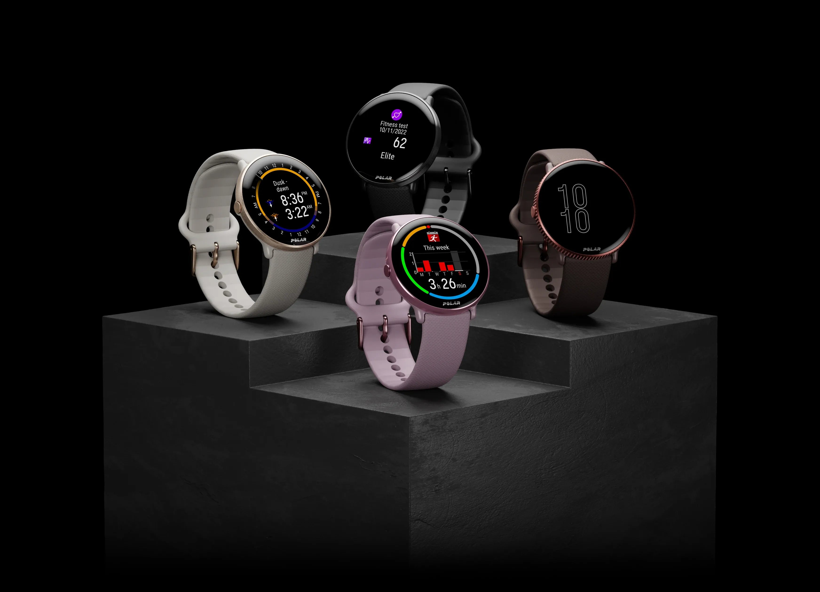 Four multi-sport smartwatches in different colors displayed on black pedestals | Polar Philippines