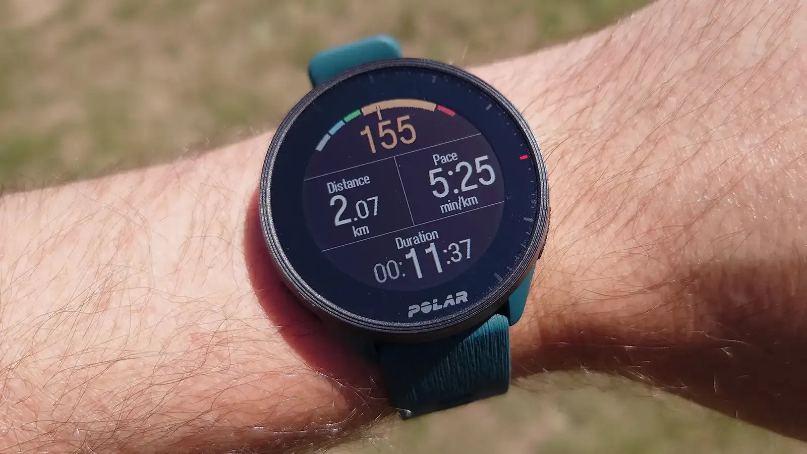 Man wearing a smartwatch displaying real-time running stats during a workout | Polar Philippines