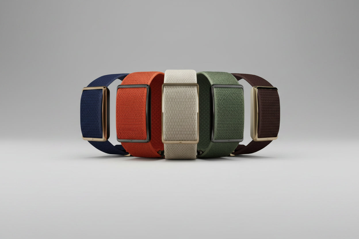 Five fitness wrist bands in different colors on a clean gray backdrop | Polar Philippines
