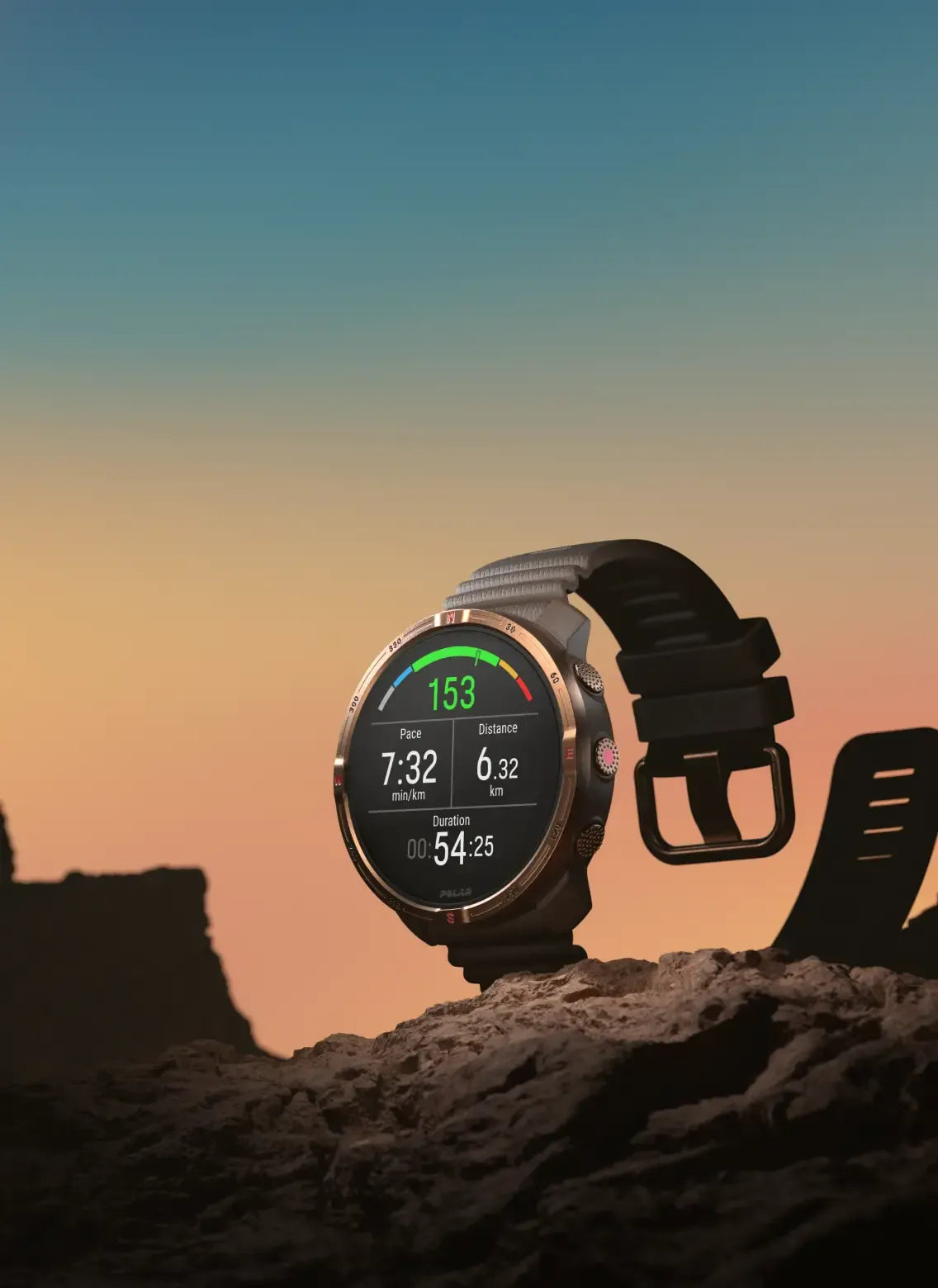 GPS fitness watch resting on rocky terrain during a golden hour sunrise | Polar Philippines