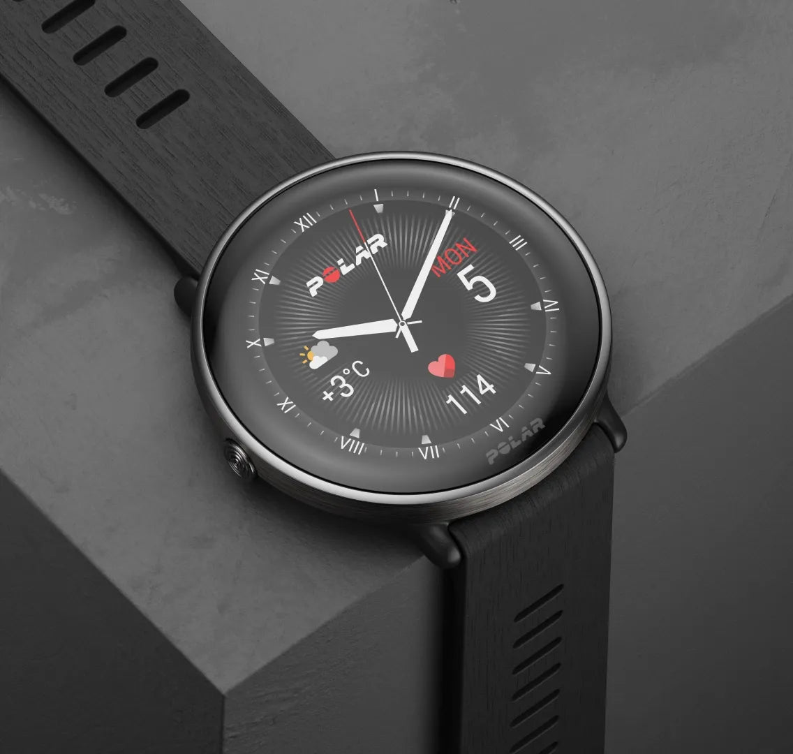 Smartwatch displaying analog watch face with health metrics | Polar Philippines