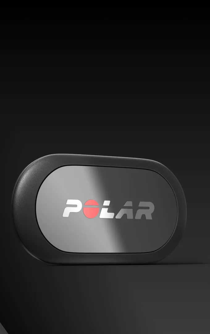 Textile chest strap fitness monitor with central tracking pod on clean background | Polar Philippines