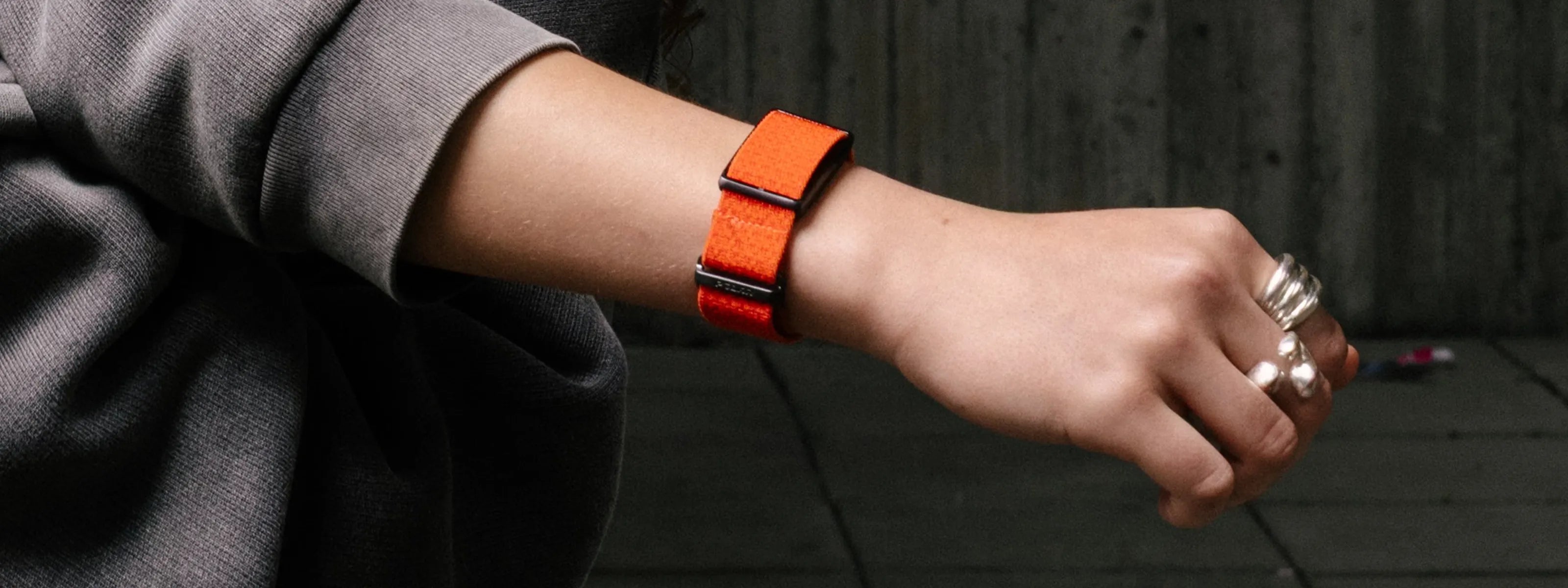 Woman wearing health band, fitness tracker, and smart rings for wellness tracking | Polar Philippines