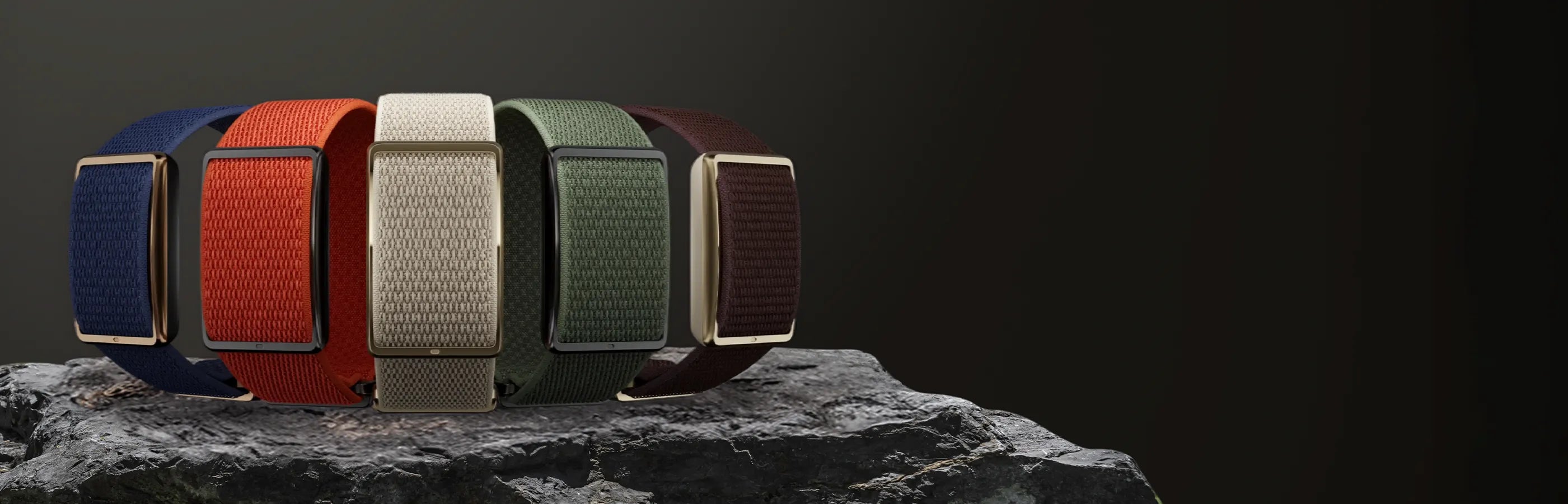 Collection of heart rate sensors displayed on a rock with a dark beige background | Polar Philippines