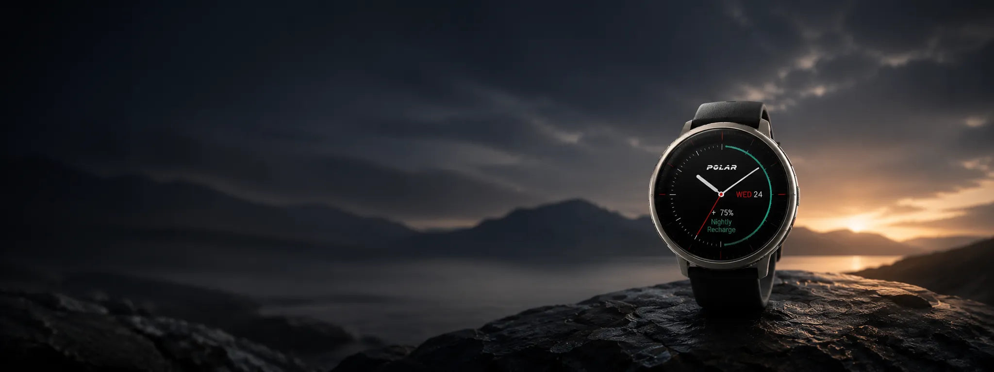 Smartwatch on rocky landscape at sunset with Nightly Recharge display | Polar Philippines